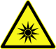 Avertissement sur les rayons lumineux, symbole D-W009 introduit par la norme allemande DIN 4844-2