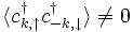 \langle c^\dagger_{k,\uparrow} c^\dagger_{-k,\downarrow}\rangle \ne 0