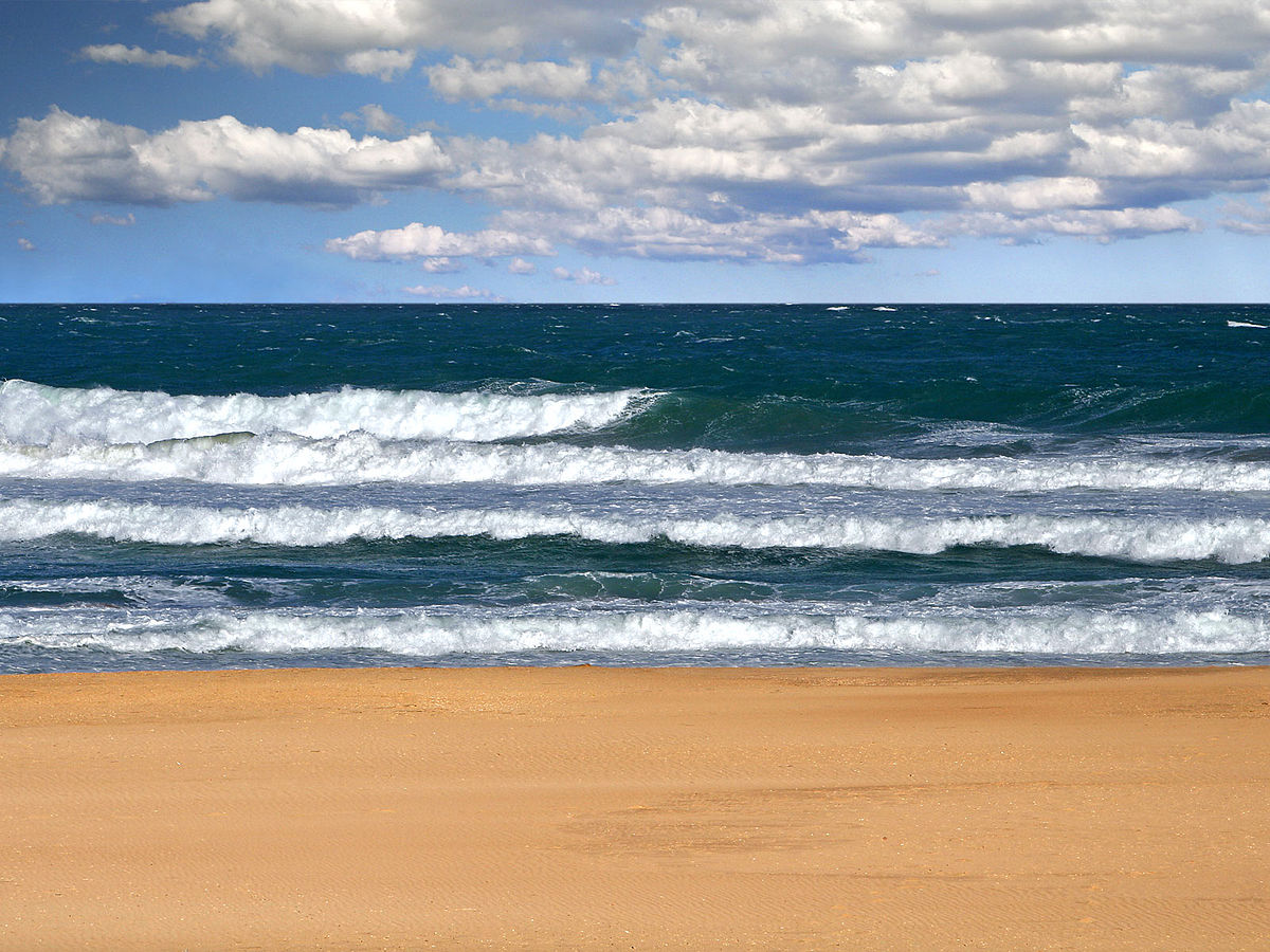 Scène familière où l'on voit simultanément les trois compartiments que sont lithosphere, hydrosphère et atmosphère.