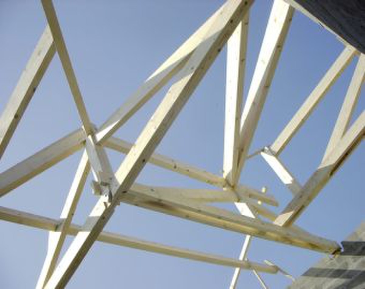 Exemple de charpente traditionnelle avec arétiers et noue