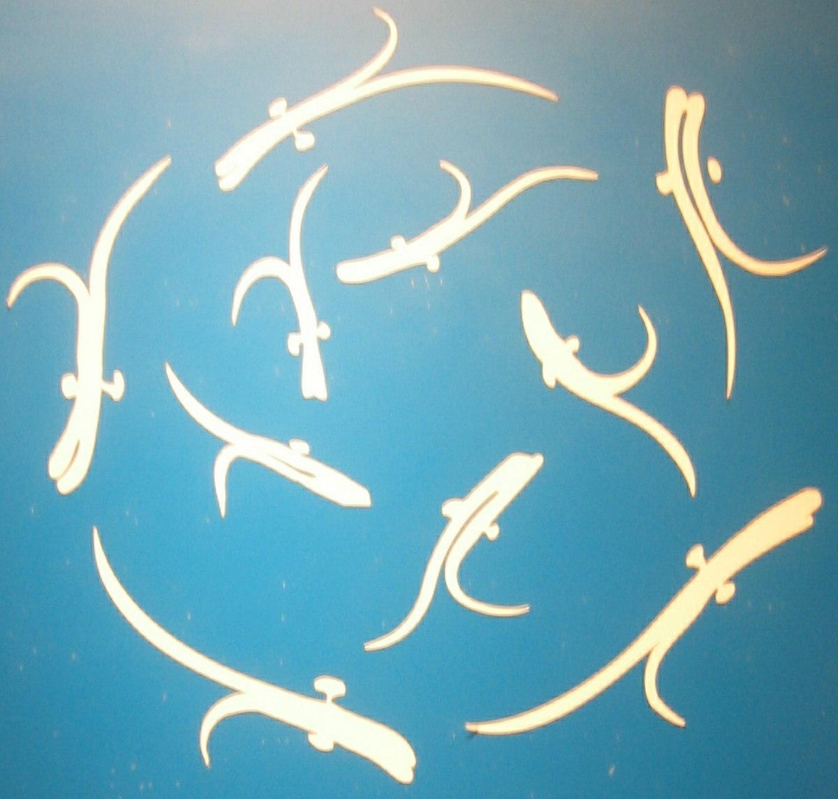 poissons des bassins du Partal, stylisés par les artistes des Nasrides.