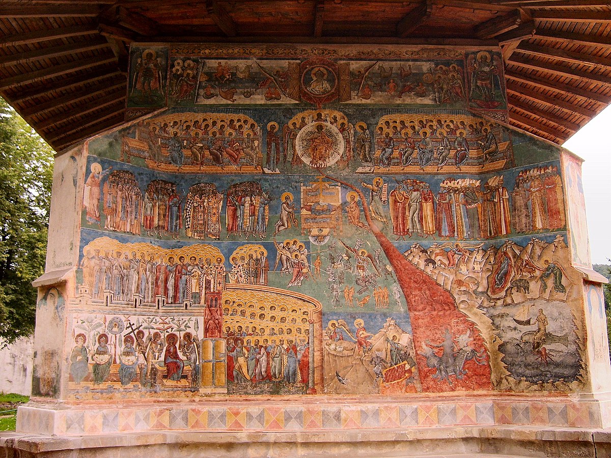 Le jugement dernier, peinture en style orthodoxe byzantin sur les murs de la monastères Vorone? construite en 1488 en Roumanie. On y voit a gauche le paradis avec les saints et l'Arbre de la Vie, à droite les enfers avec des démons et le feu qui descend dans les abysses et en haut l'image contemplative du Christ tout puissant. A droite et à gauche du Christ, on voit les signes du zodiaque .