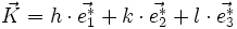 \vec{K} = h \cdot \vec{e^_1} + k \cdot \vec{e^_2} + l \cdot \vec{e^*_3}
