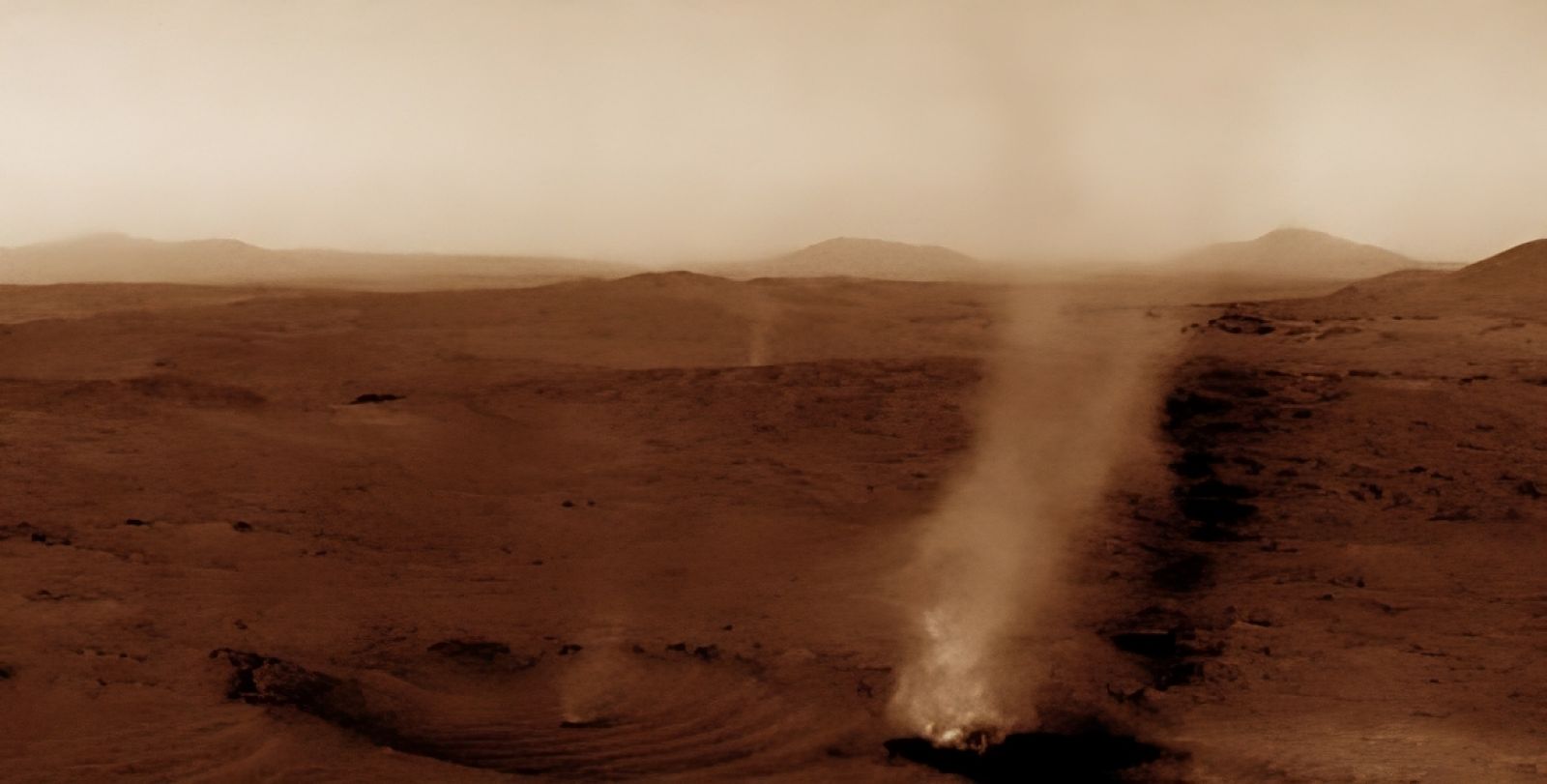 A dust devil absorbs another dust devil on Mars 🌪️