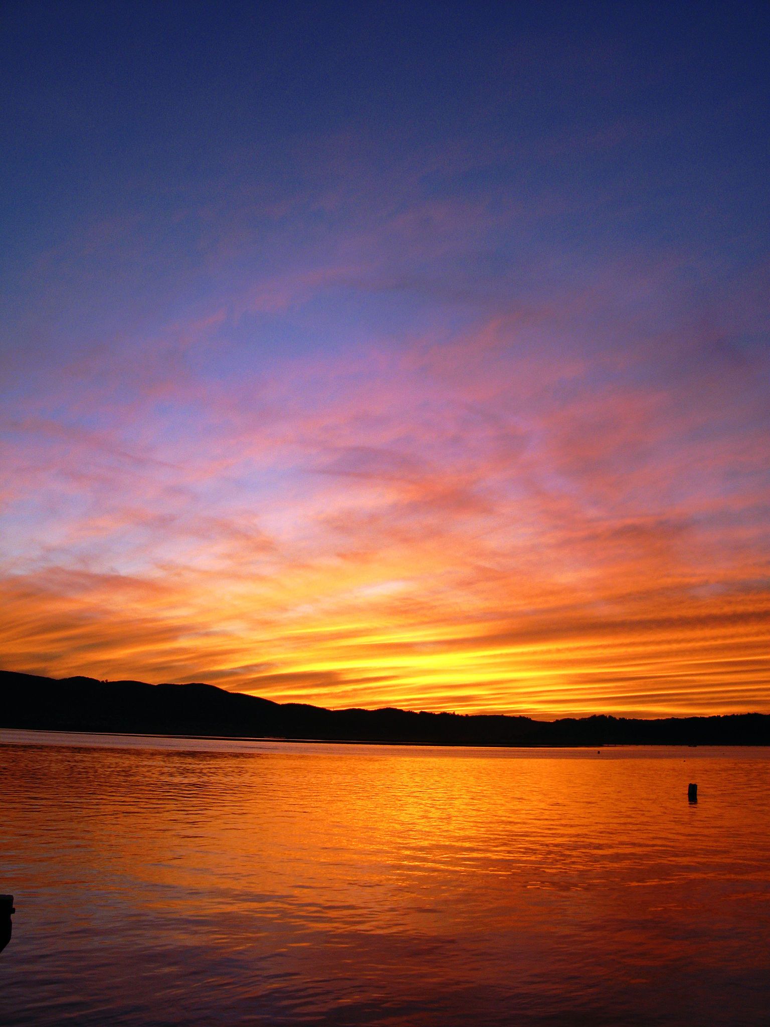 The sky is blue because the setting sun is orange (or the other way around?)
